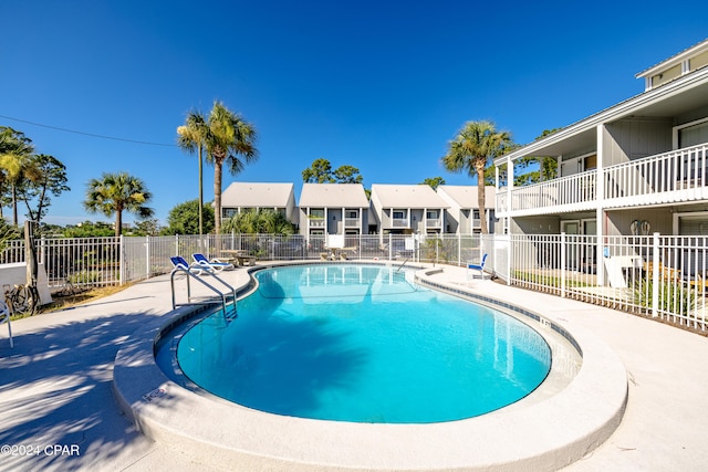 view of pool featuring a patio area