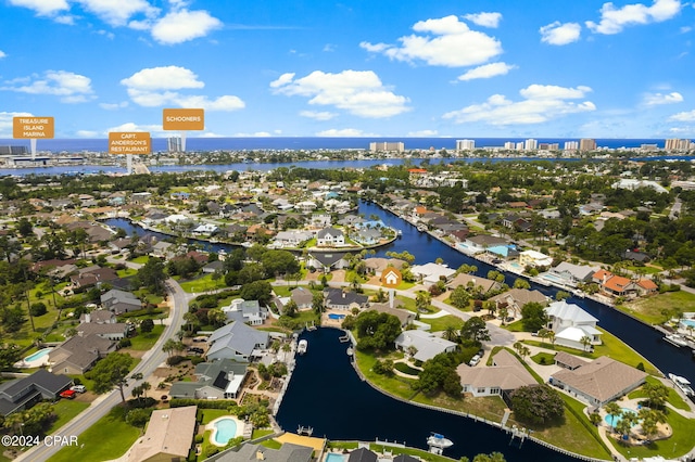 aerial view with a water view and a residential view