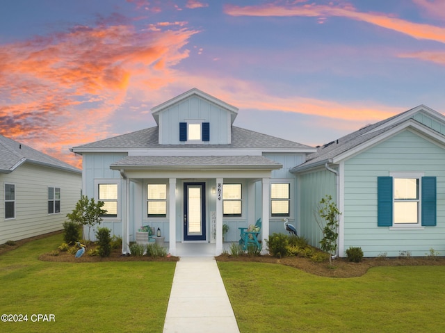 view of front of house with a lawn