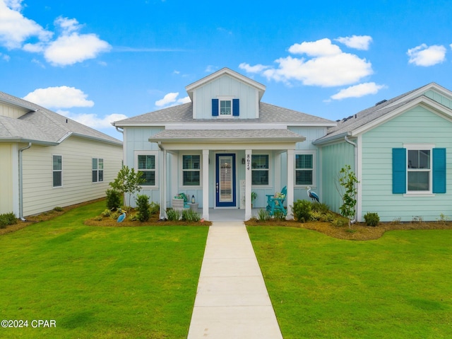 view of front of property with a front lawn