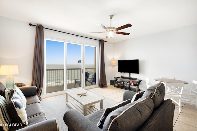 living room with light tile patterned flooring and ceiling fan