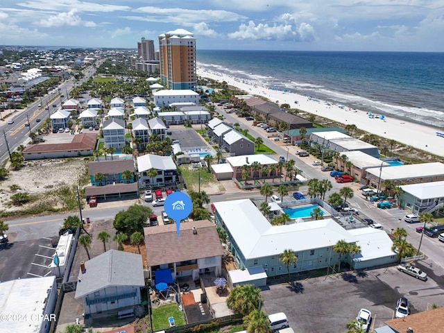 bird's eye view with a beach view and a water view