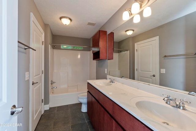 full bathroom with dual vanity, tile flooring, toilet, and tub / shower combination