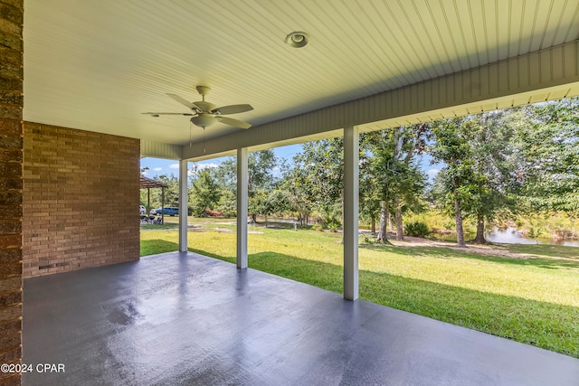 view of terrace featuring ceiling fan