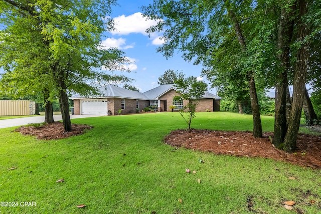 view of yard featuring a garage