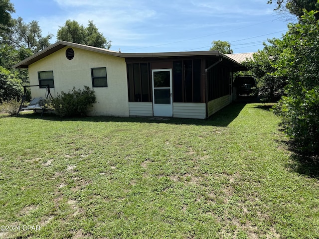 view of property exterior with a yard