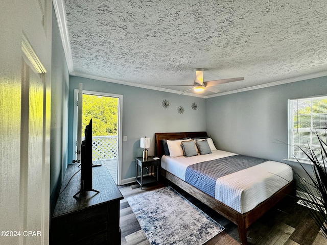 bedroom featuring a textured ceiling, wood finished floors, access to exterior, baseboards, and crown molding