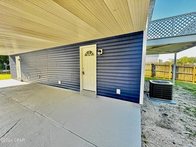 property entrance featuring central air condition unit