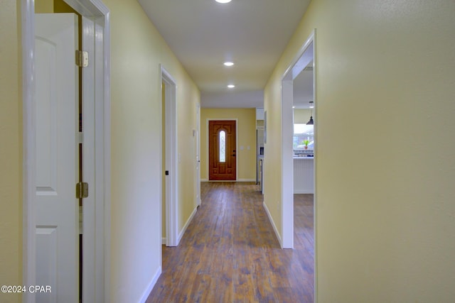 hall featuring dark wood-type flooring