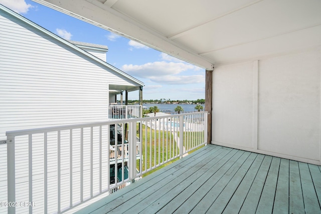 deck featuring a water view