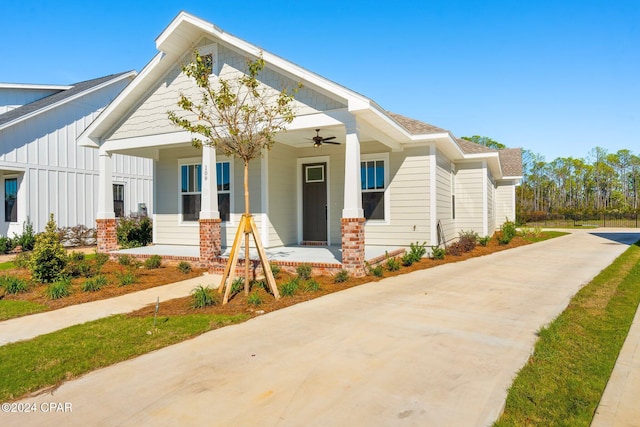 view of front of home featuring ceiling fan and a porch