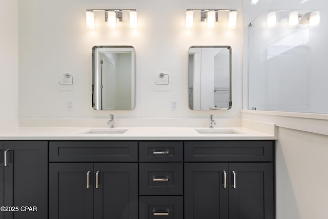 full bathroom featuring a sink and double vanity