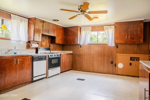 kitchen with light tile patterned flooring, ceiling fan, and white appliances