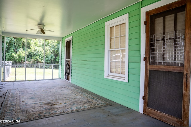 view of patio / terrace featuring ceiling fan