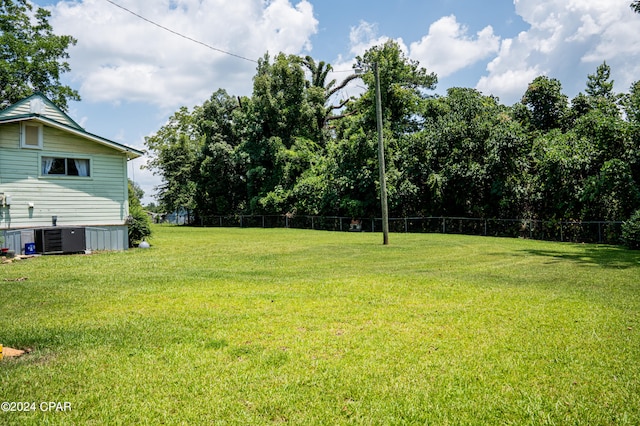 view of yard featuring central AC