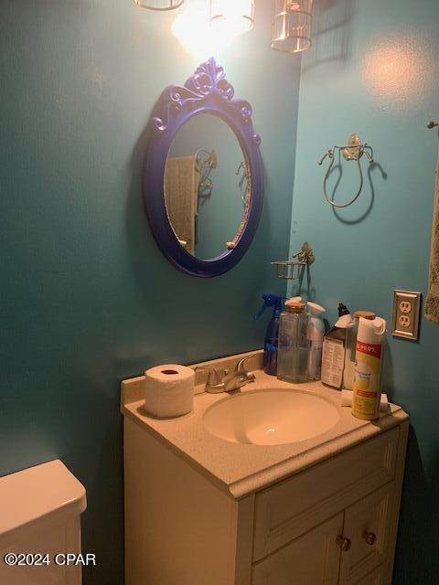 4908 Davis Dr, Marianna, FL 32446 - bathroom with toilet and vanity