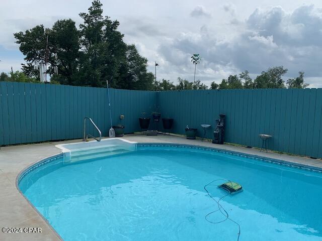 4908 Davis Dr, Marianna, FL 32446 - view of swimming pool featuring a fenced in pool and a fenced backyard