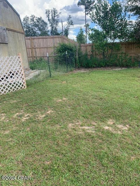 4908 Davis Dr, Marianna, FL 32446 - view of yard with a fenced backyard