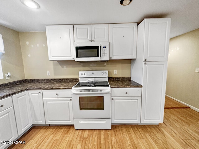 kitchen featuring white cabinetry, white appliances, and light wood-type flooring