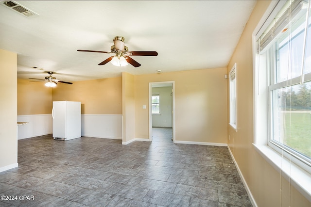 spare room featuring ceiling fan