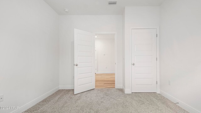 hall featuring hardwood / wood-style flooring