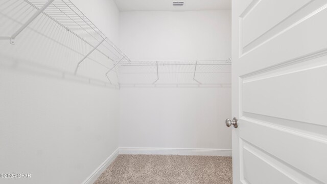 bathroom with wood-type flooring and toilet