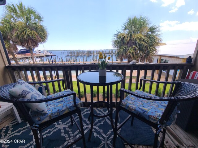 deck featuring a water view