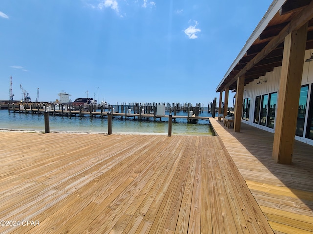 dock area featuring a water view