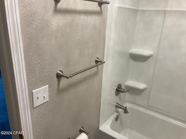 bathroom featuring bathing tub / shower combination