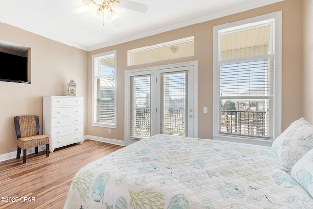 bedroom featuring access to exterior, ornamental molding, light hardwood / wood-style floors, and ceiling fan