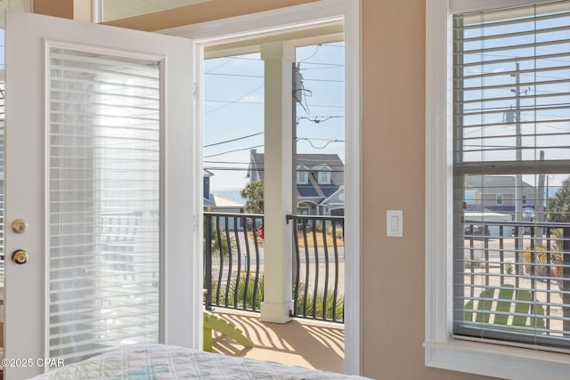 doorway to outside featuring a healthy amount of sunlight