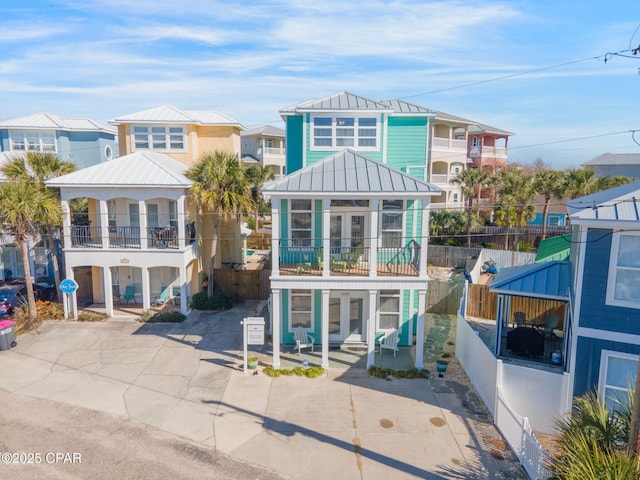 view of front of property with a balcony