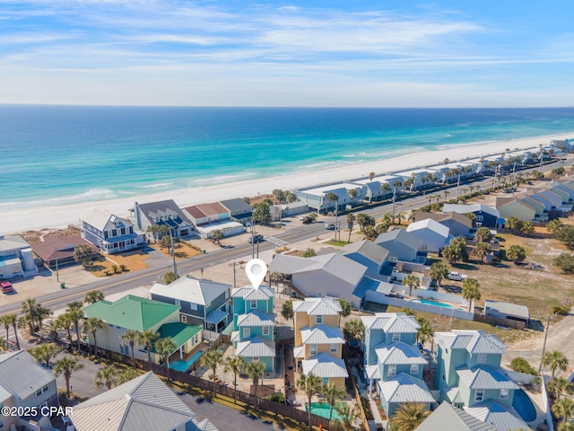 bird's eye view with a view of the beach and a water view