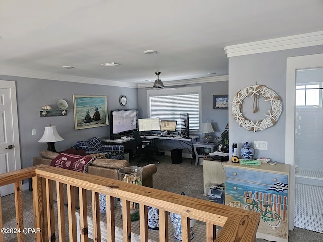 living room featuring carpet floors, crown molding, and ceiling fan