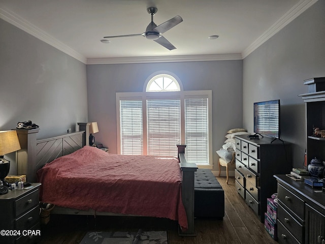 bedroom with ornamental molding, ceiling fan, and dark wood-type flooring