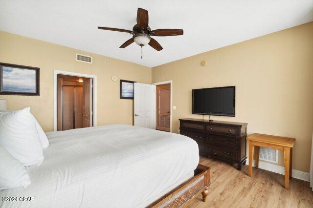 bedroom featuring ceiling fan and light wood-type flooring