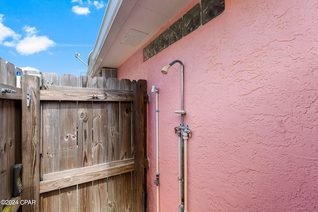 details featuring stucco siding