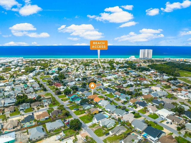 bird's eye view with a water view and a residential view