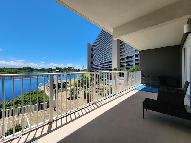 balcony featuring a water view