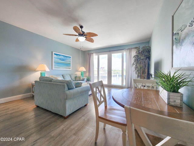 interior space featuring hardwood / wood-style flooring, french doors, and ceiling fan