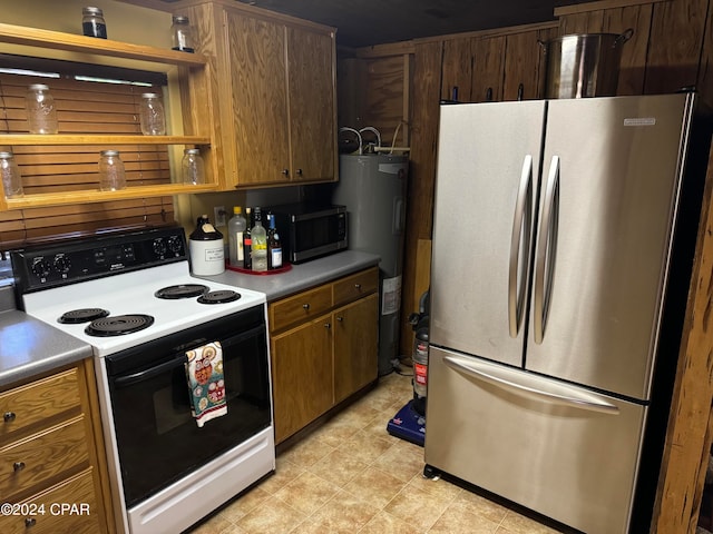 kitchen with light tile patterned flooring and stainless steel appliances