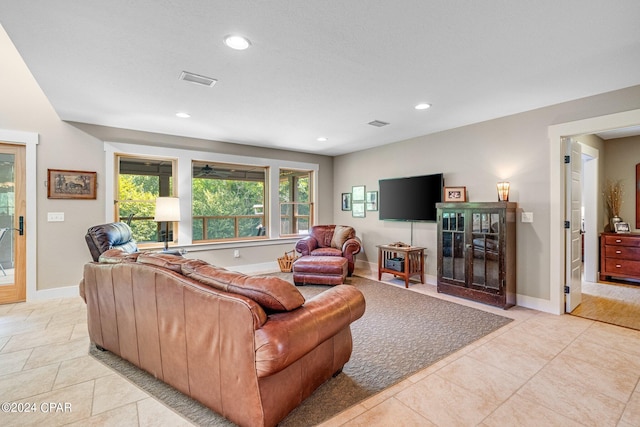 living room with light tile patterned flooring