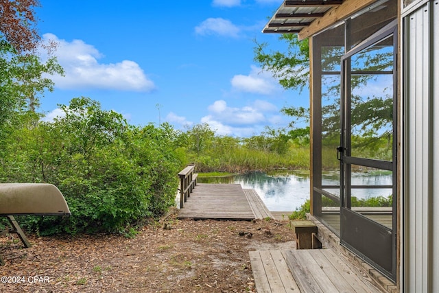 dock area featuring a water view