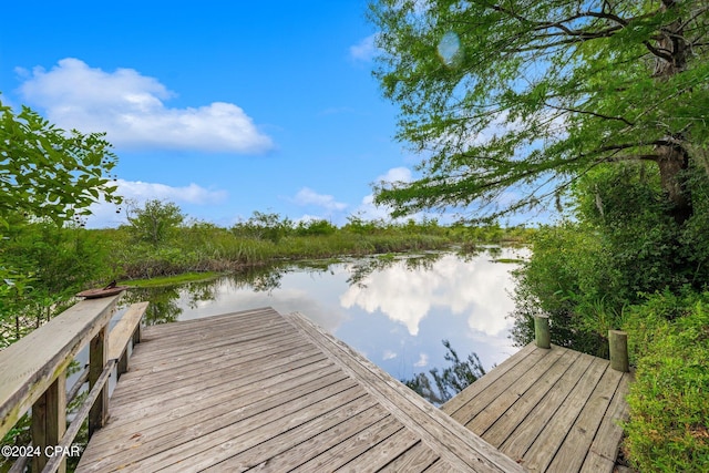 view of dock with a water view