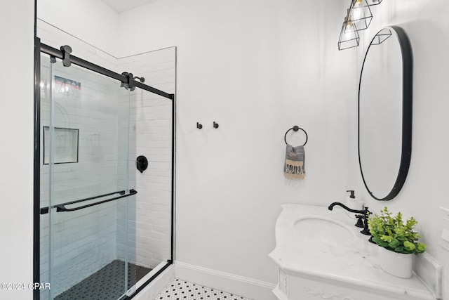 bathroom featuring walk in shower, tile patterned flooring, and sink