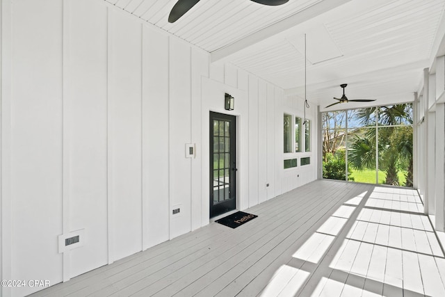 wooden deck with ceiling fan