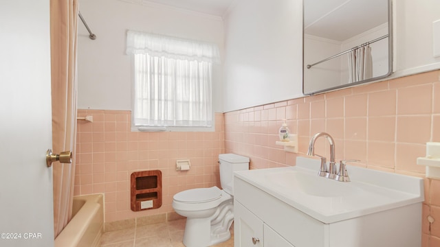 full bathroom with tile patterned flooring, vanity, toilet, and tile walls