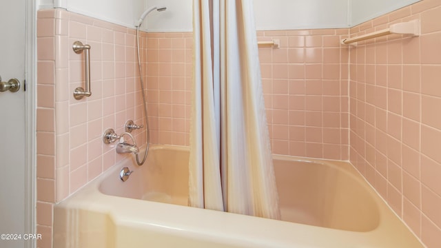 bathroom featuring shower / bath combination with curtain