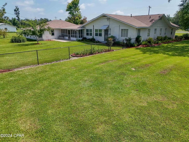 view of front of home with a front yard