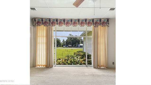 carpeted empty room with ceiling fan